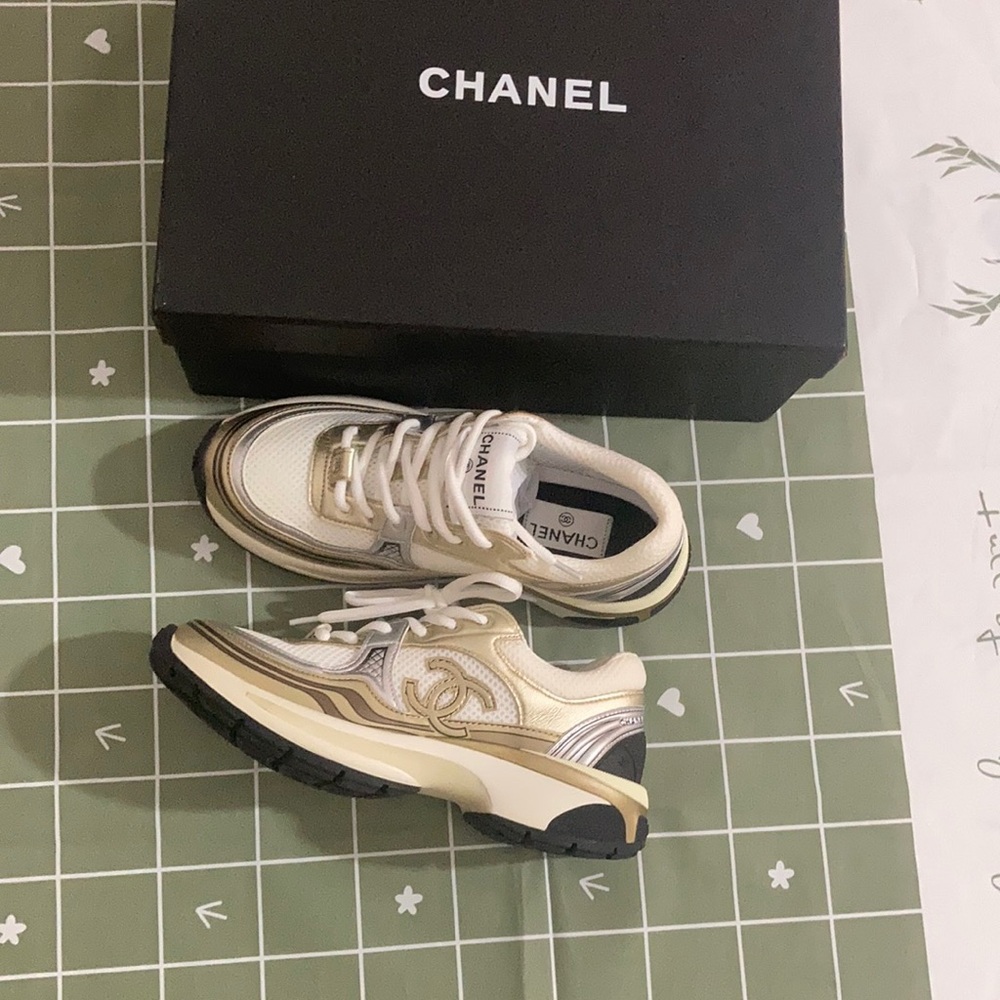 Chanel Women’s Gold and White Sneakers